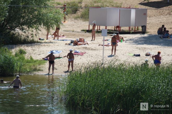 Выживание в жару: фоторепортаж с пляжей Нижнего Новгорода - фото 59