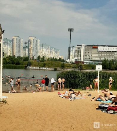 Спасение от адского пекла: фоторепортаж с пляжей Нижнего Новгорода - фото 36